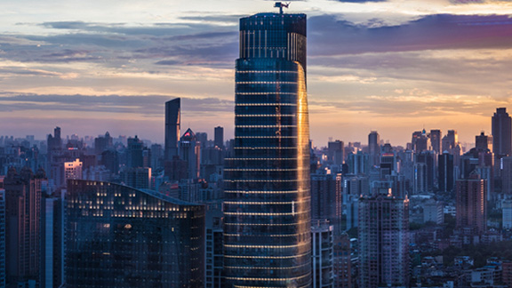 A metropolitan cityscape at sunset