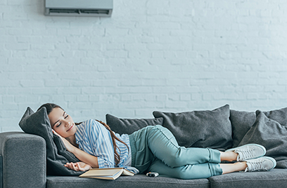 A person lying on a couch