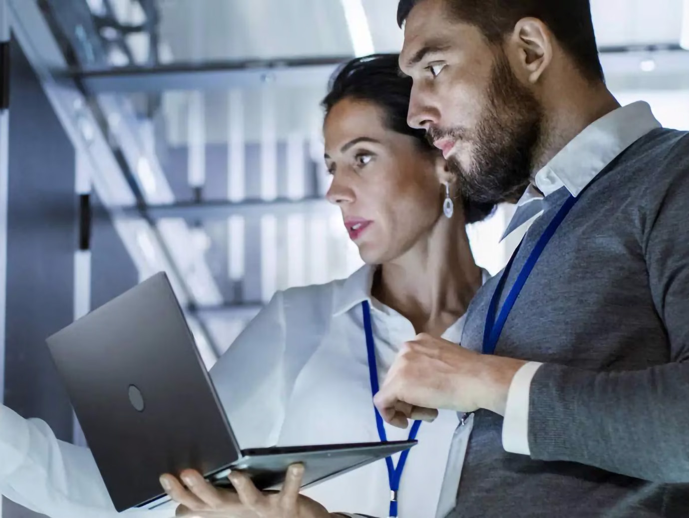 employees working with a laptop